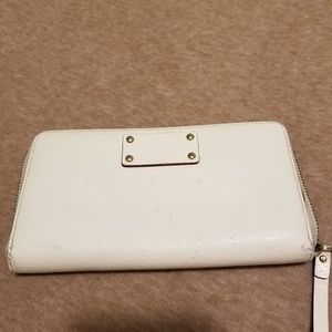 Used cream Kate Spade wallet
